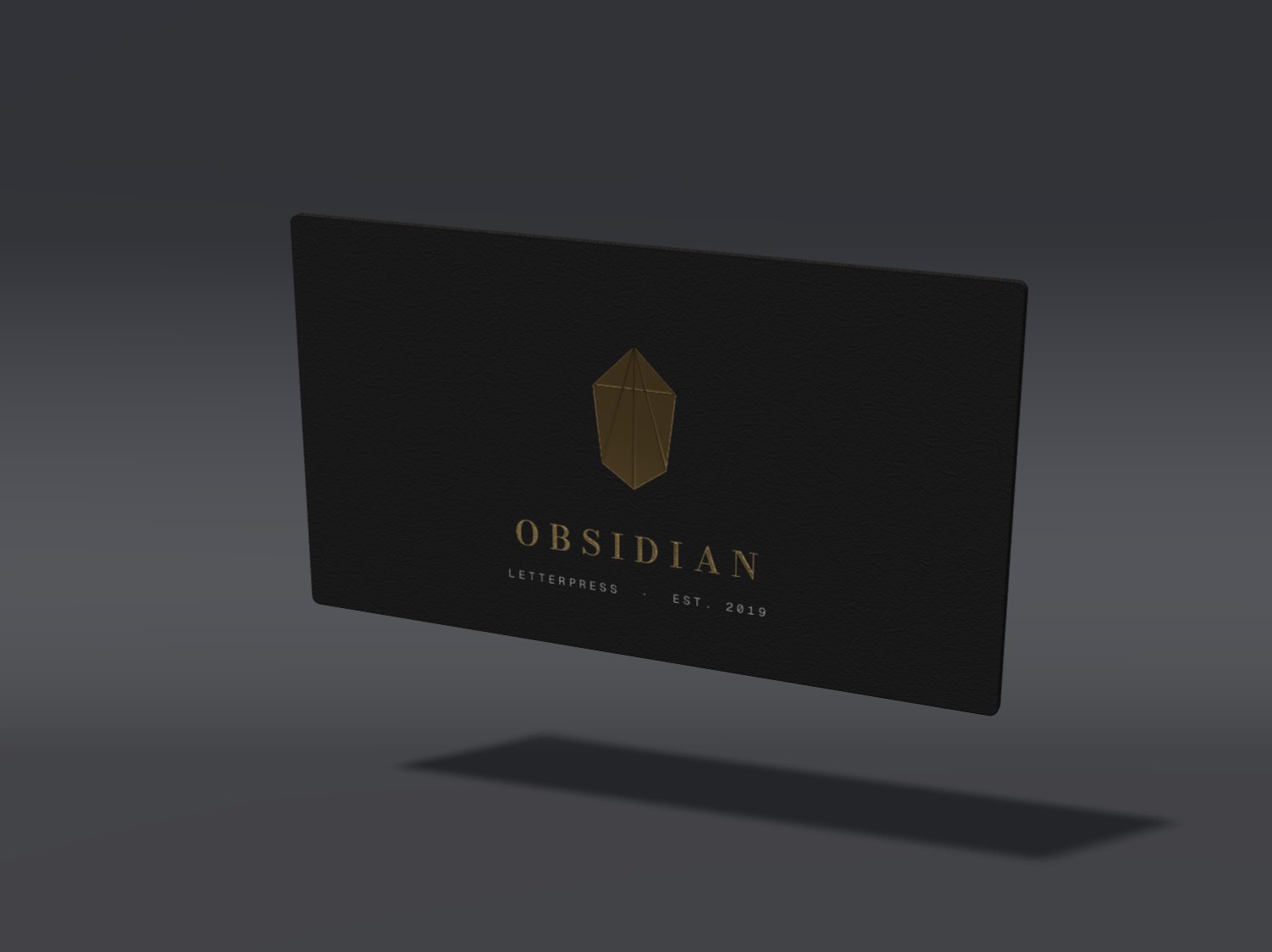Photoreal still of a foil-stamped black card on a studio sweep